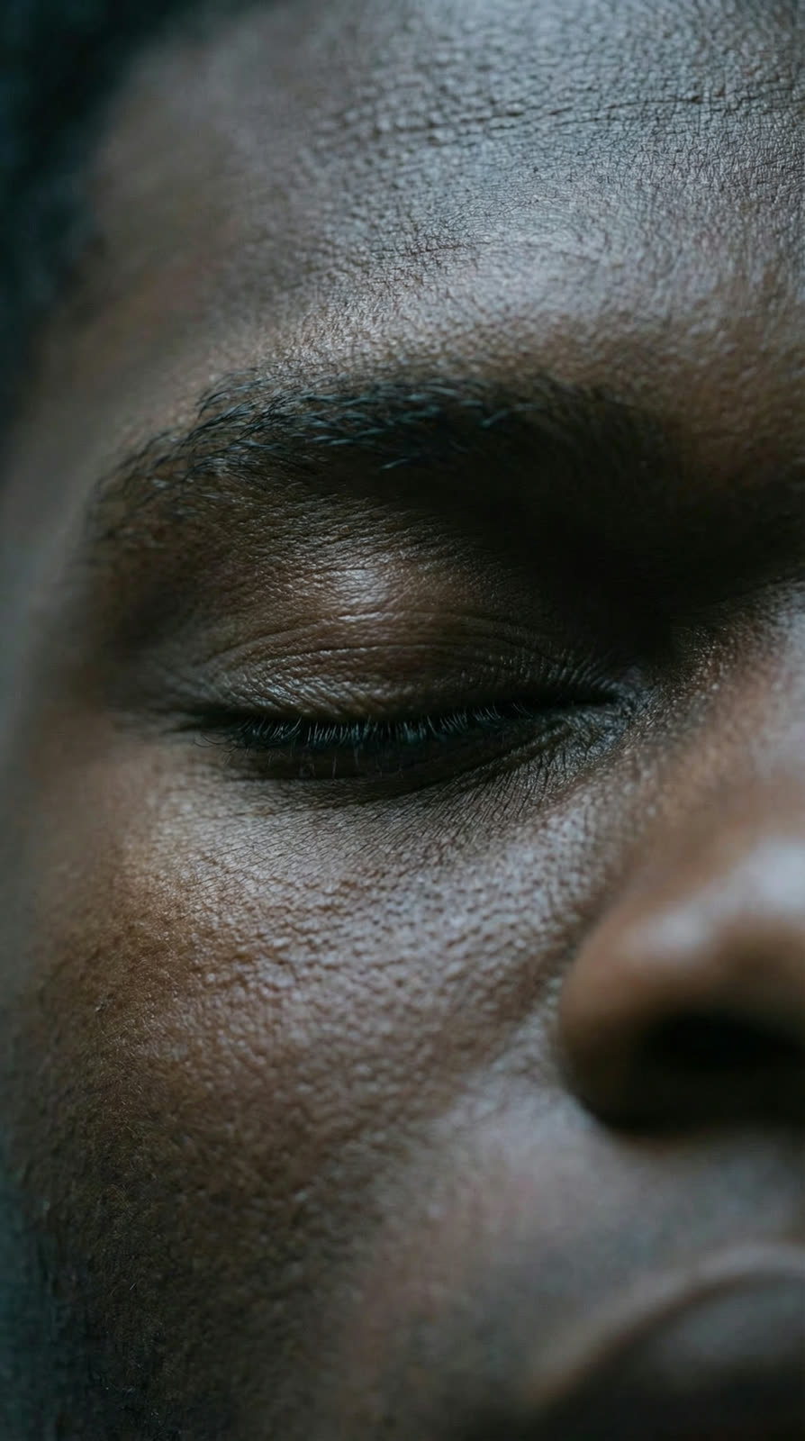 Macro of half the athlete’s face, eye closed