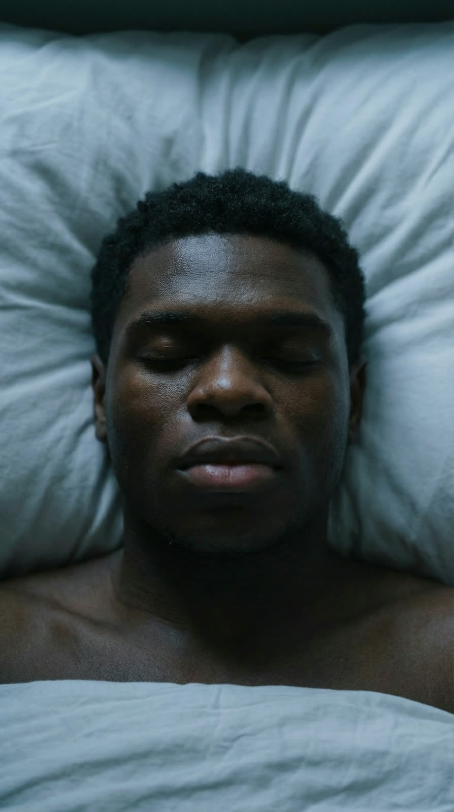The athlete on his back, eyes open before training