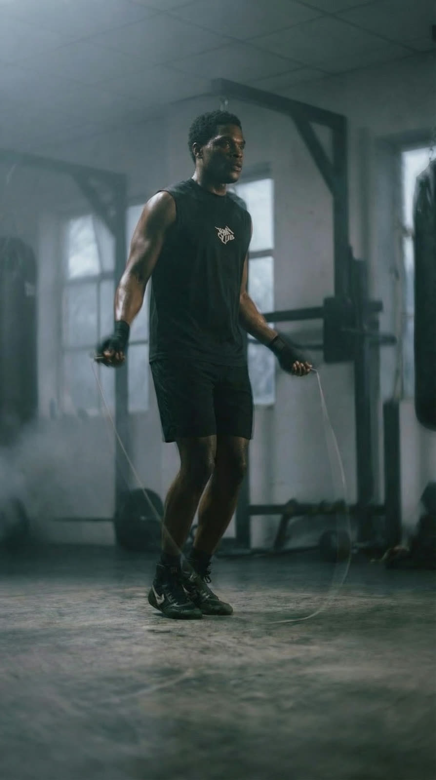 The athlete skipping rope in the gym